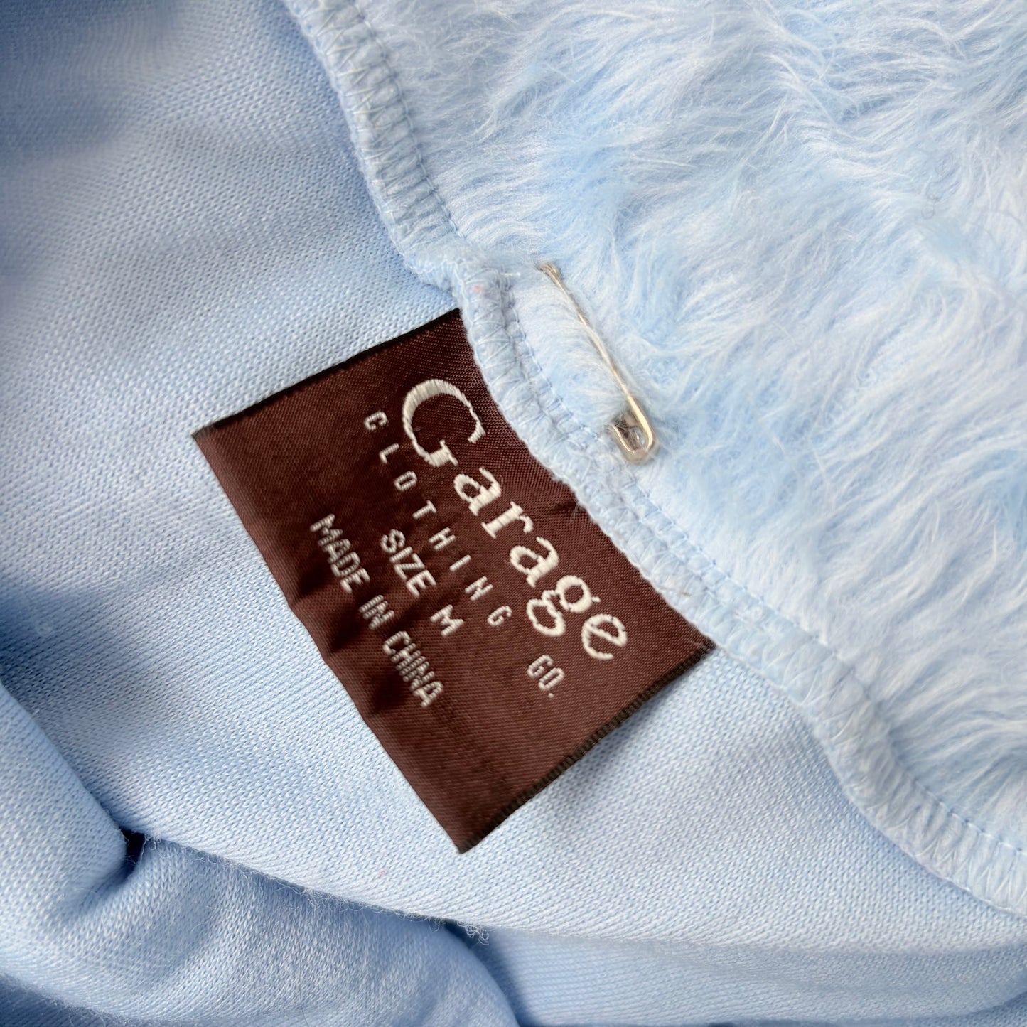 00’s Garage baby blue jumper | Size medium