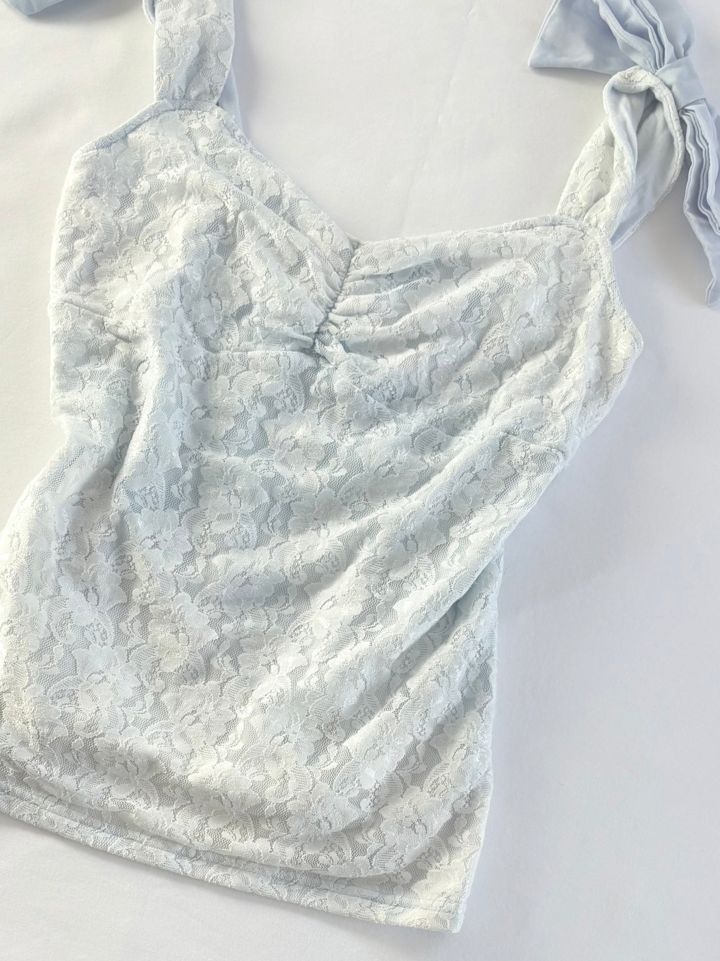 00’s Icy blue lace bow top | Size small