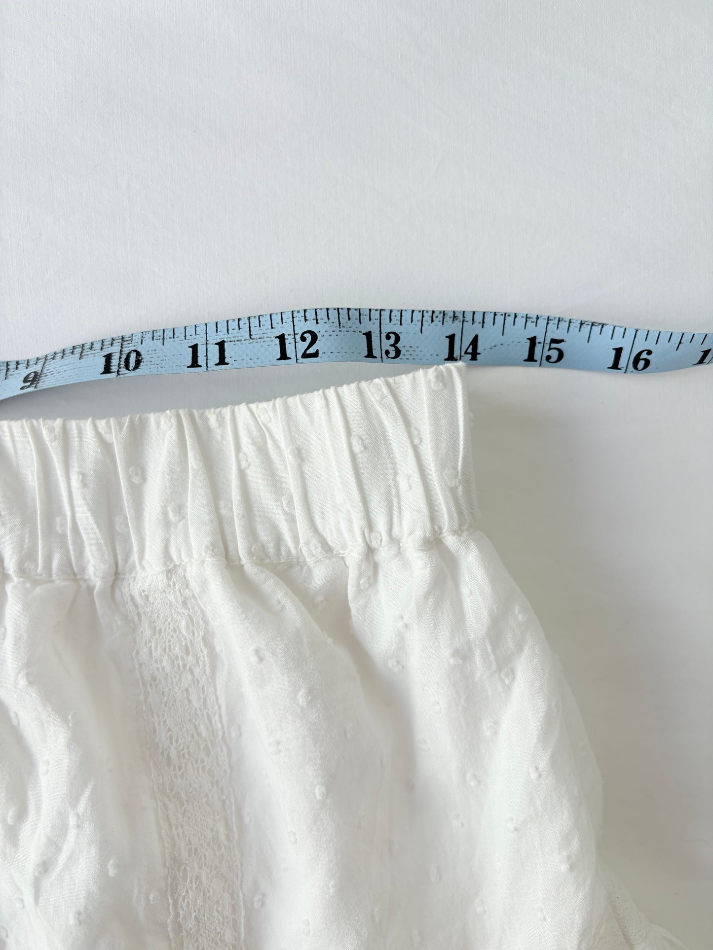 00’s Begum white mini skirt | Size 10-12