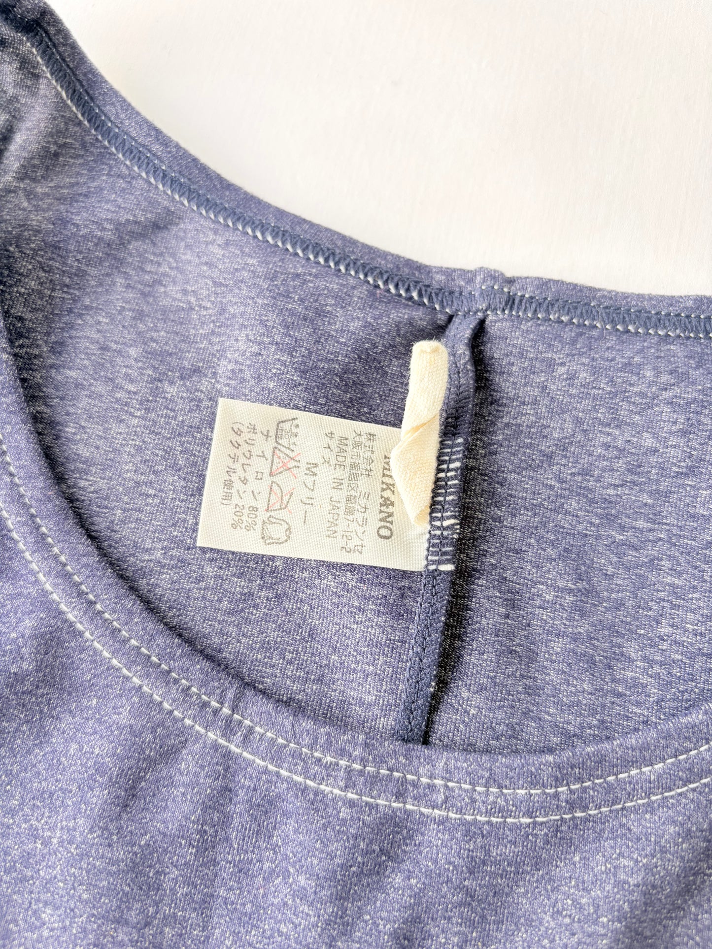 00’s Mikano sports tank | Size 6
