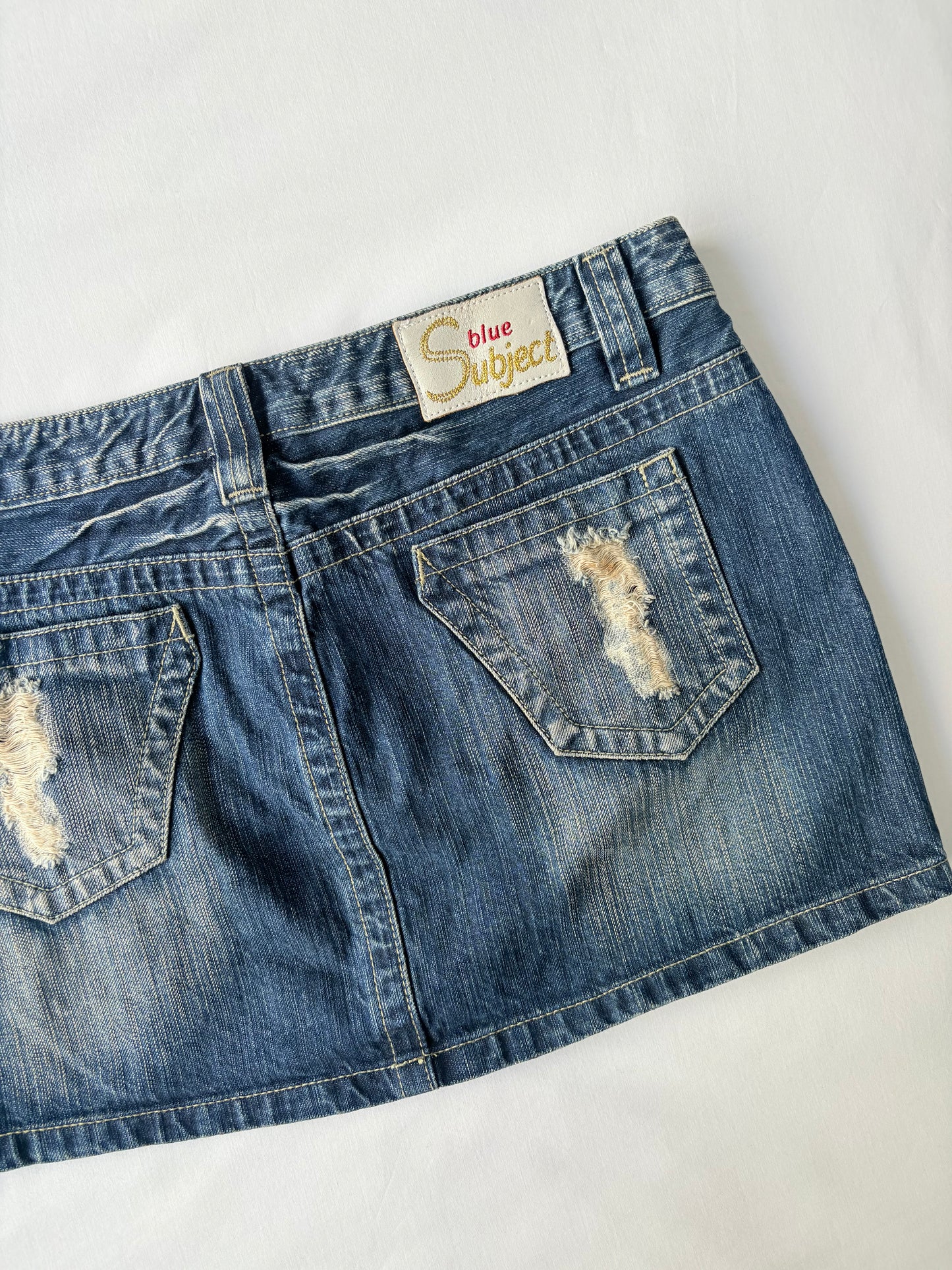 00’s Distressed denim mini skirt | Size 12