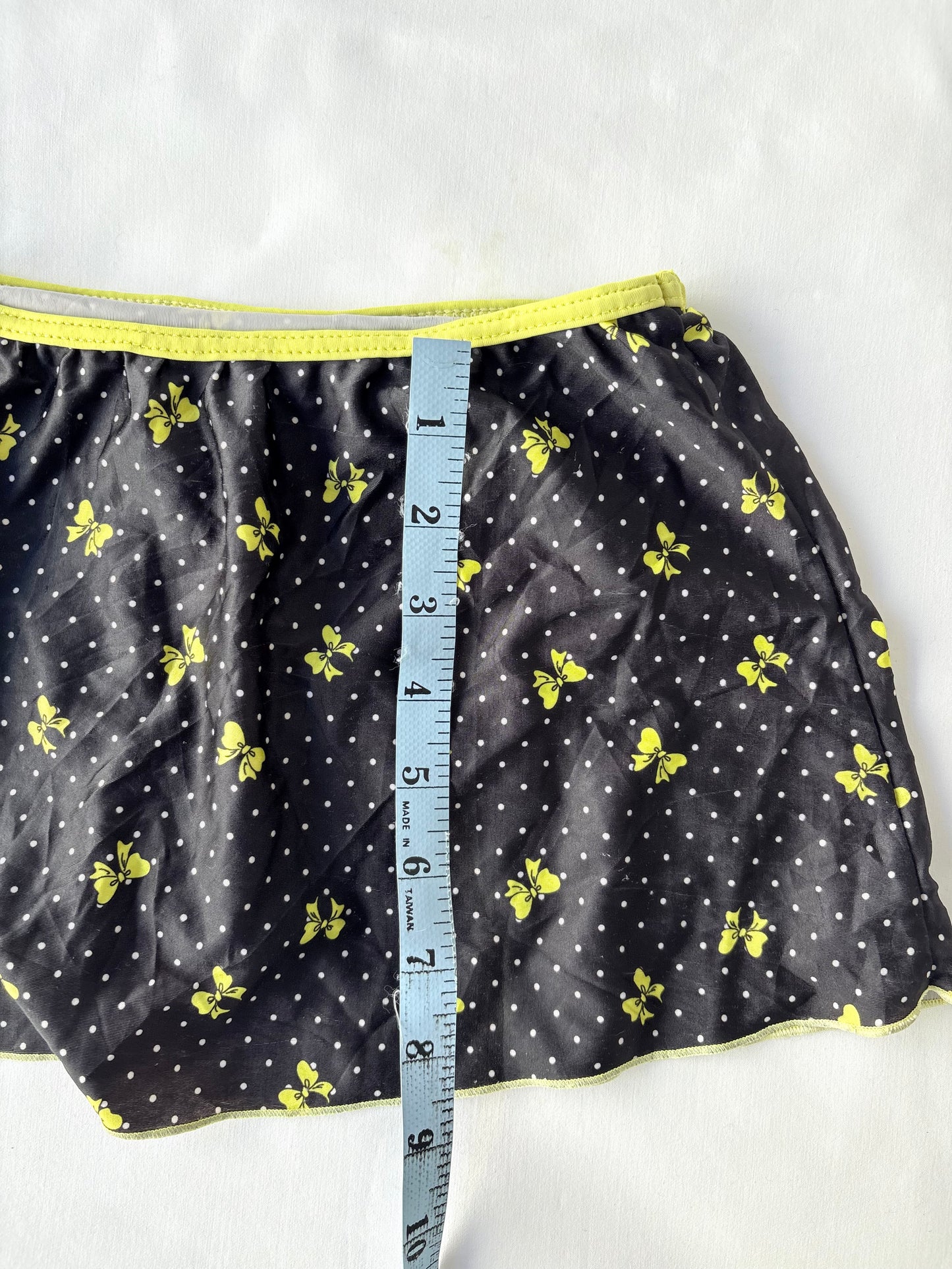 00’s Bow polka dot mini skort | Size 4