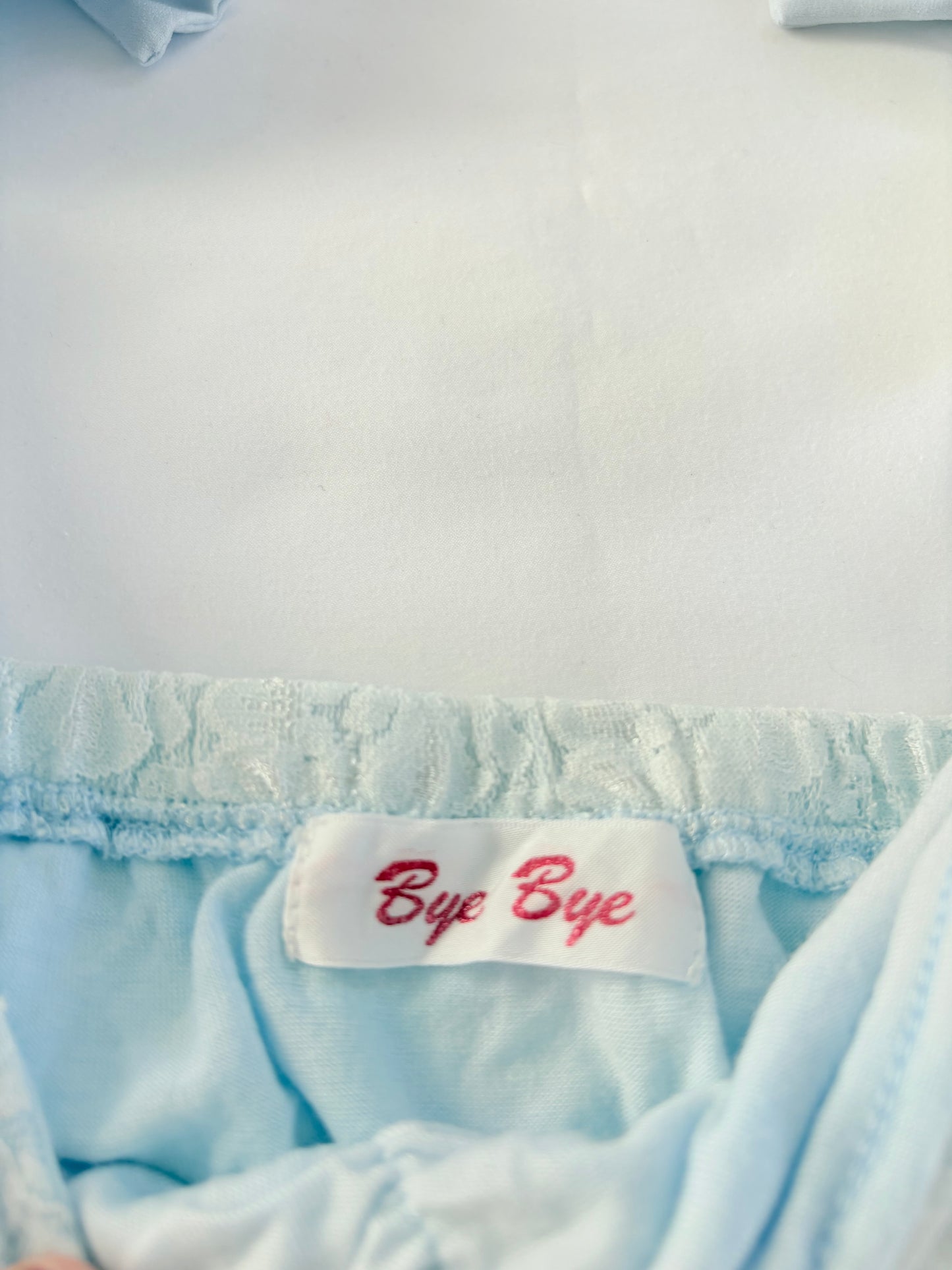 00’s Icy blue lace bow top | Size small