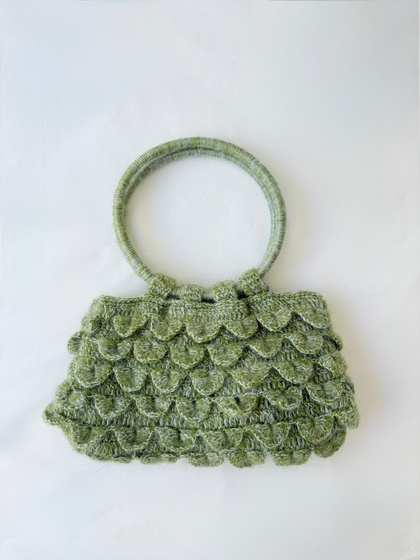 Scalloped green bag