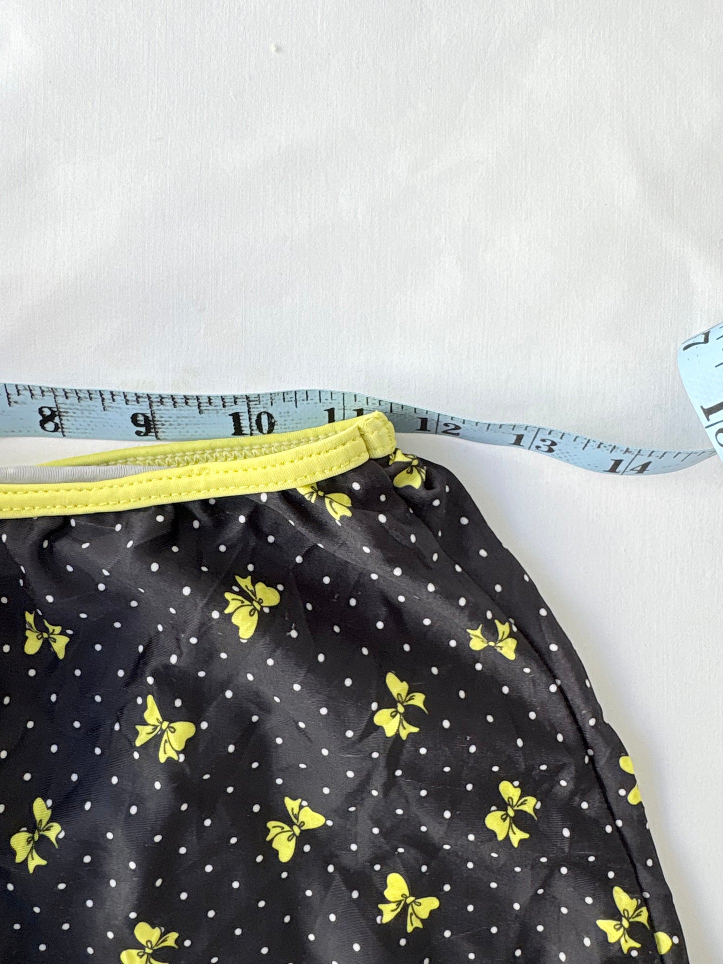 00’s Bow polka dot mini skort | Size 4