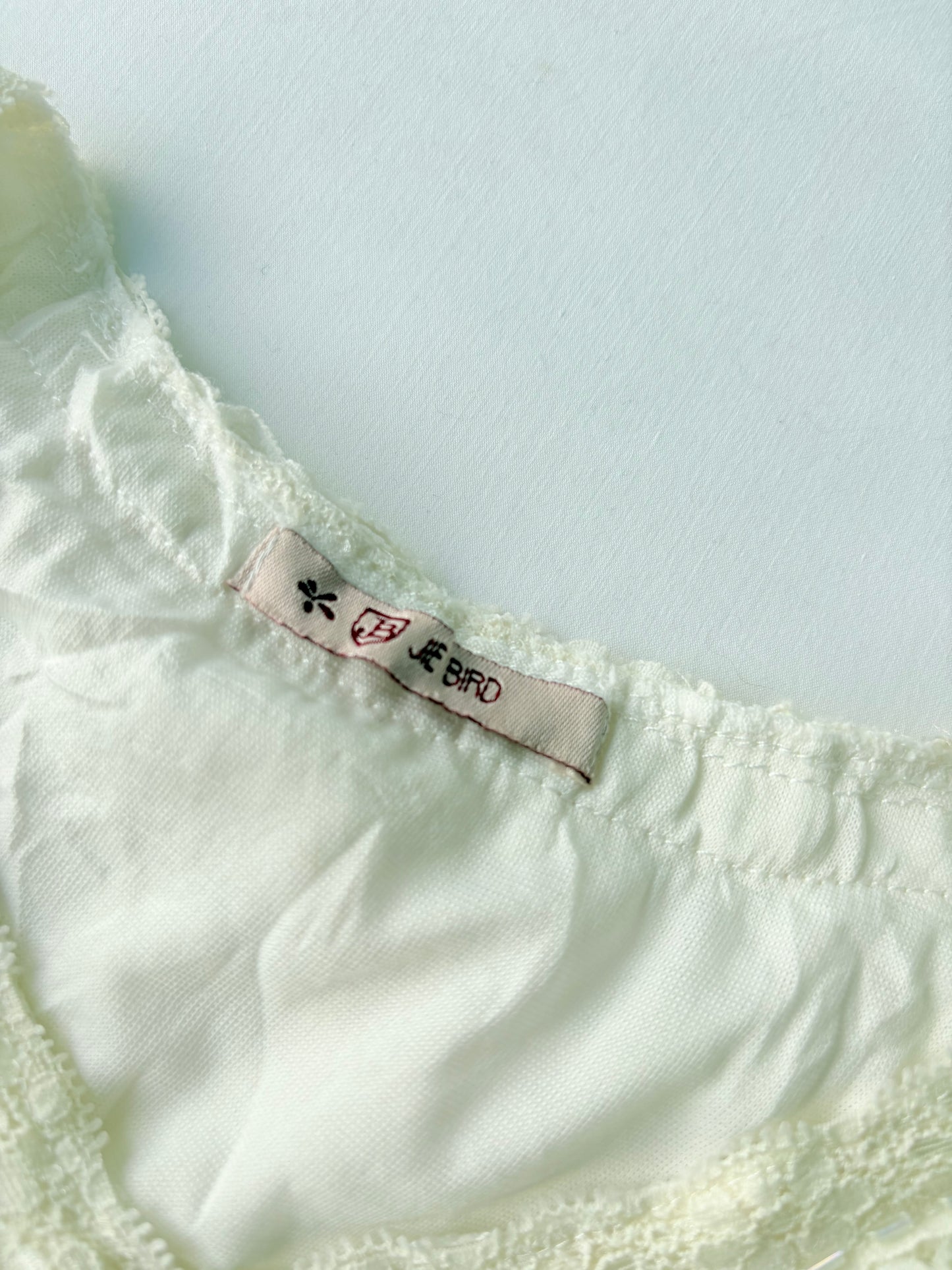 00’s Jie Bird ruffle cream top | Size small