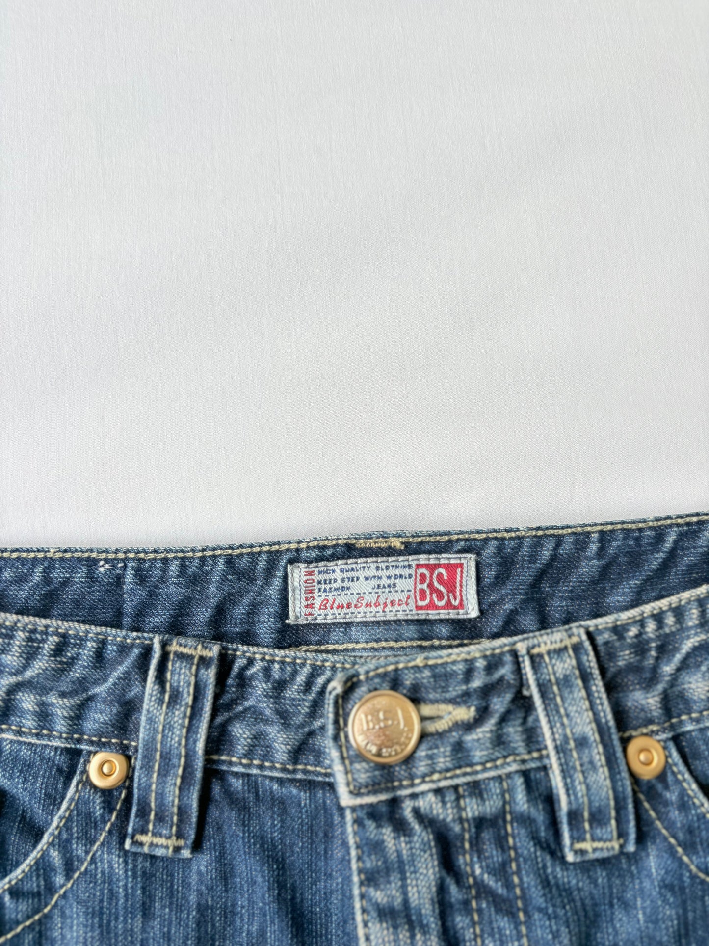 00’s Distressed denim mini skirt | Size 12